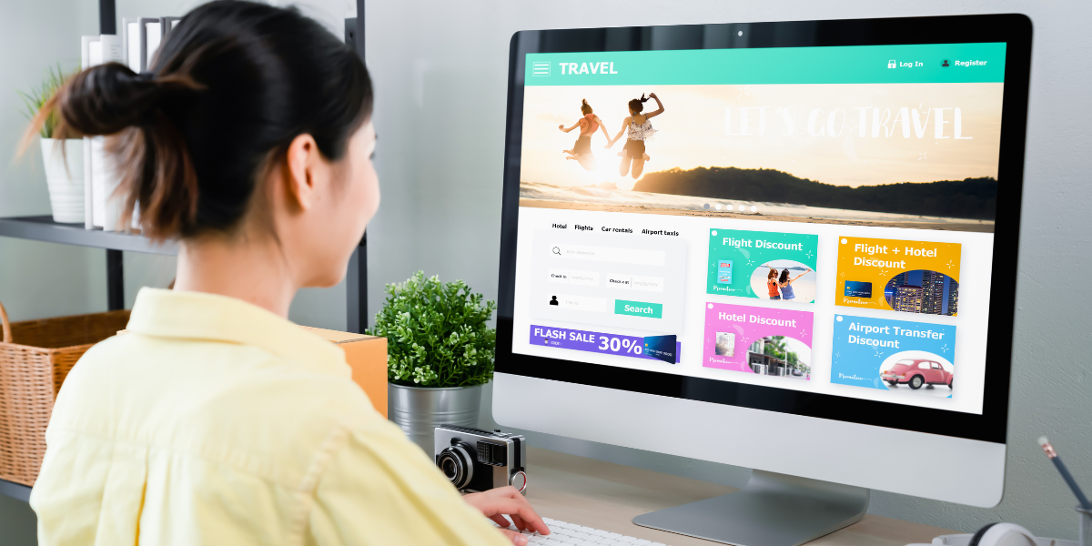 girl looking at computer with a fake travel website