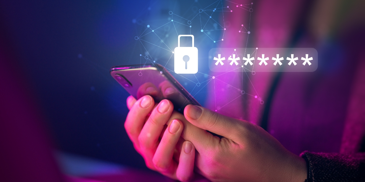 hands holding a phone with a lock symbol floating above with asterisks as a password