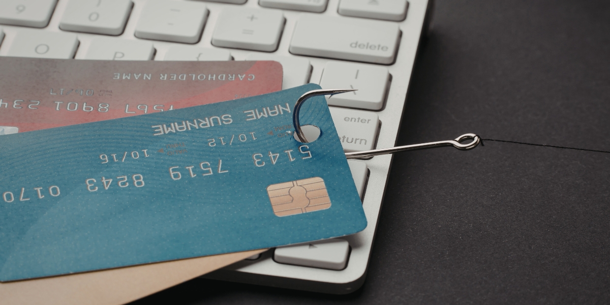 credit cards being pulled by hook