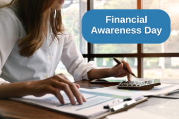 woman using calculator and looking at finance report Banner