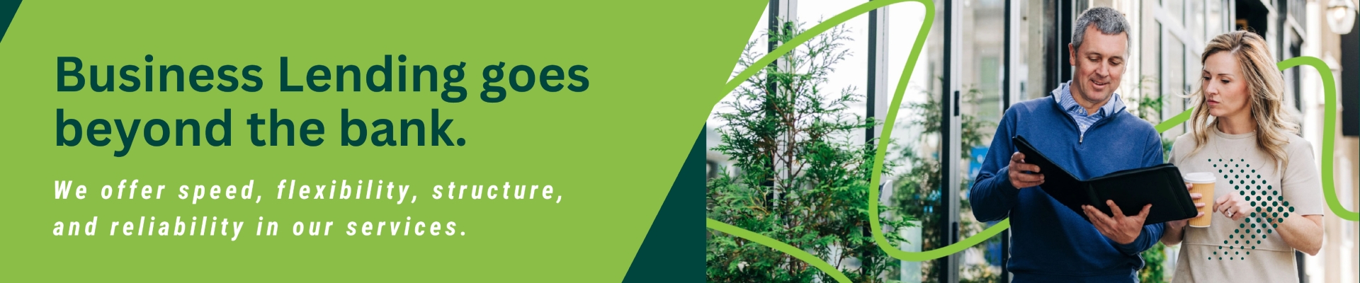 Buddy walking with a woman that says Business Lending Goes Beyond The Bank Banner