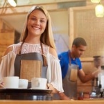 Teen female coffee shop employee