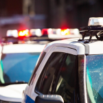 top of cop cars with sirens on