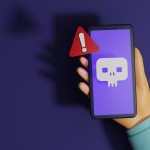 hand holding phone with red alert and scam emoji on screen